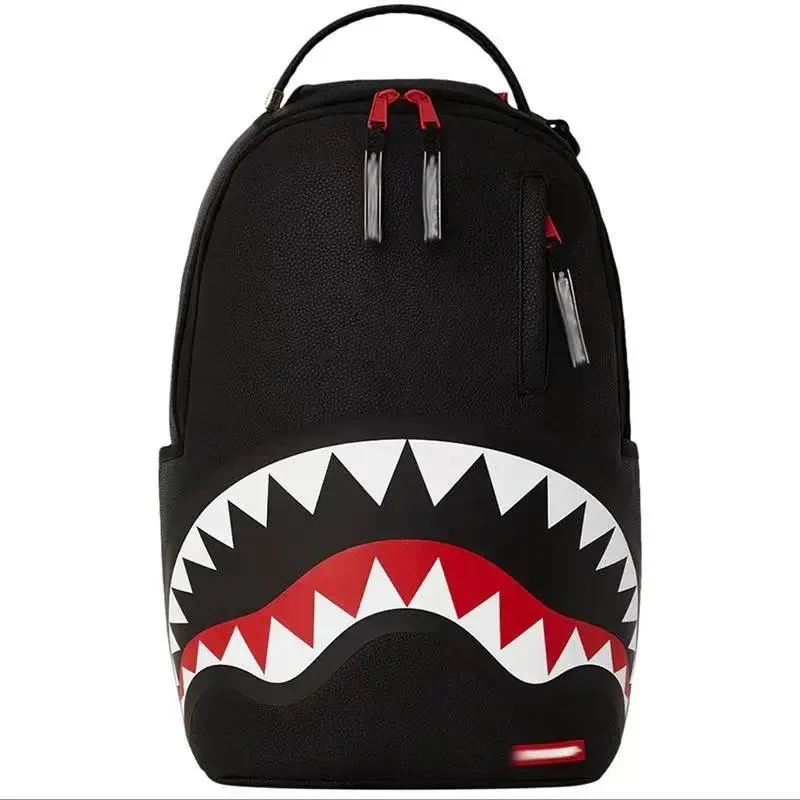 Black backpack with a white and red shark-mouth graphic