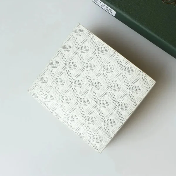 White patterned wallet shown in the linked Goyard catalog listing