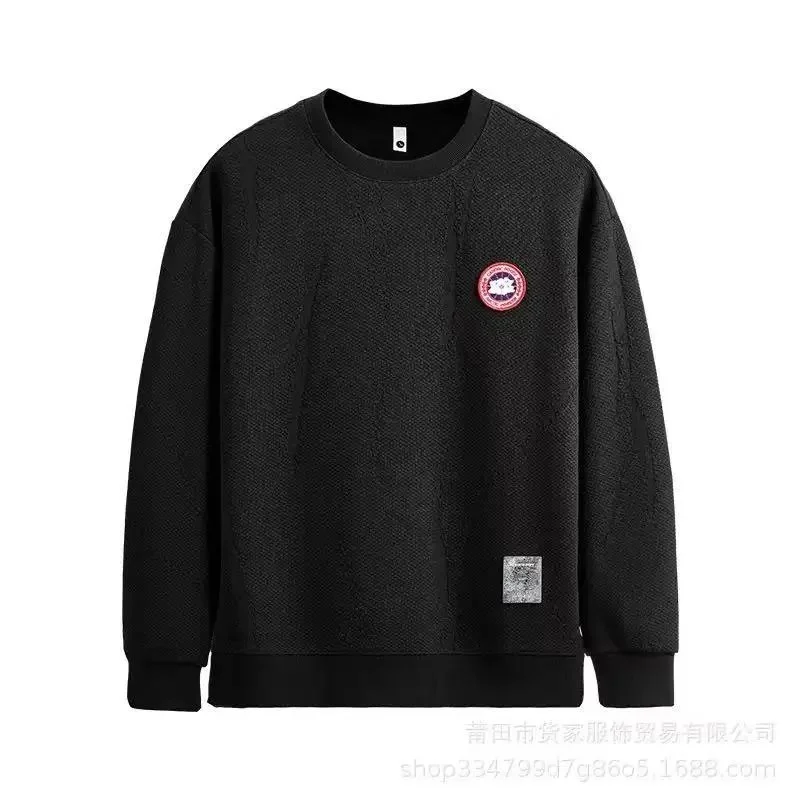 Black crewneck sweatshirt with a round chest patch